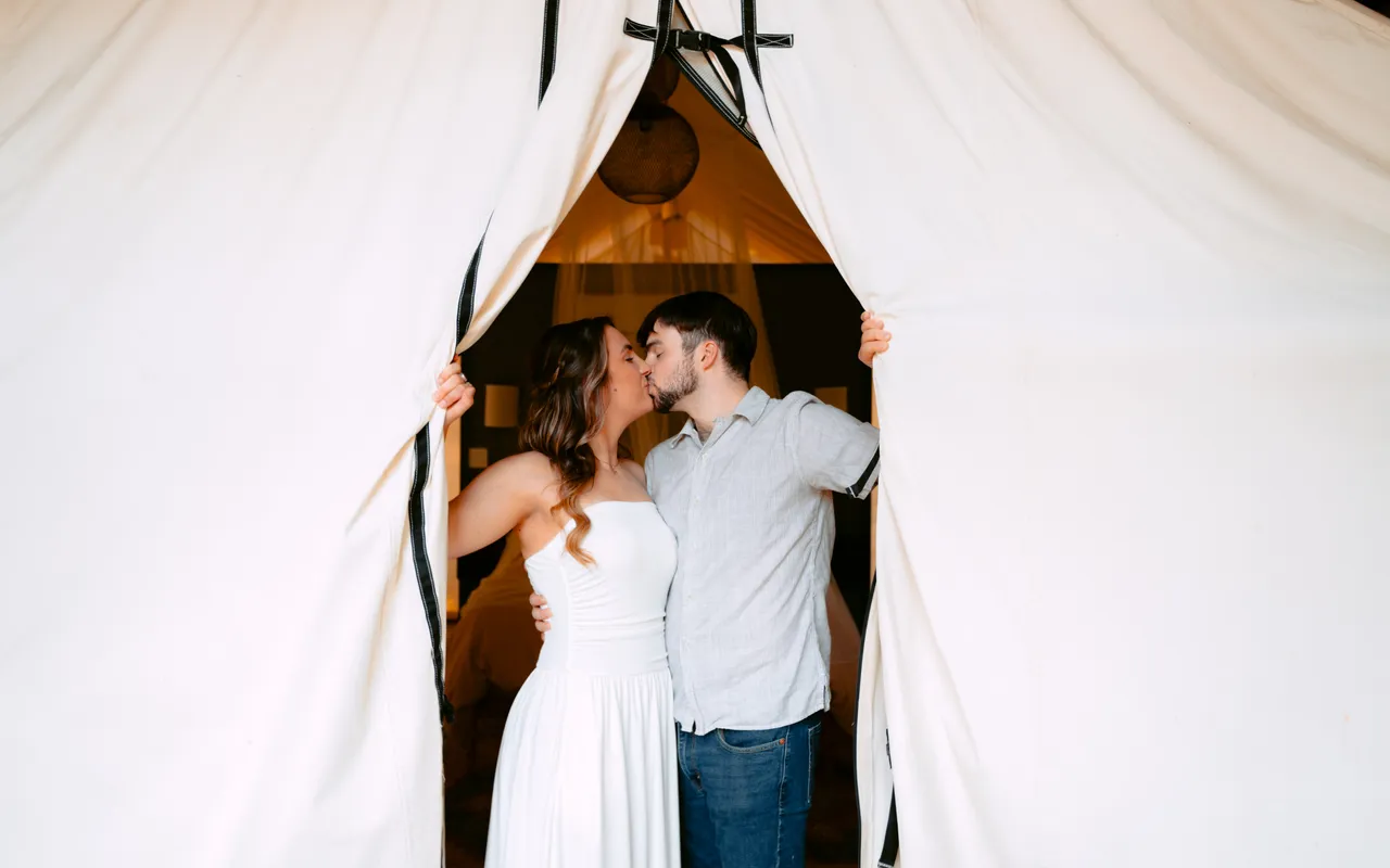 Framed in the doorway of the tent