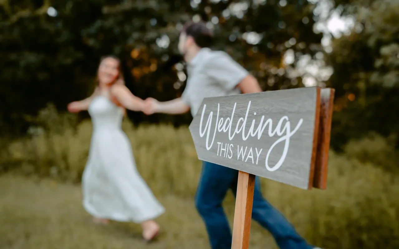 The venue sign, and the announcement frame they came for